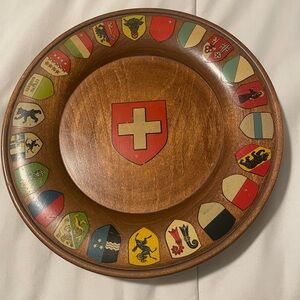 Vintage Wooden Plate with Colorful Shields